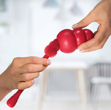 Load image into Gallery viewer, KONG CLEANING BRUSH  makes cleaning KONG Classic shaped toys quick and easy
